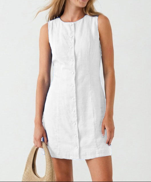 Woman wearing a white sleeveless dress on a plain background