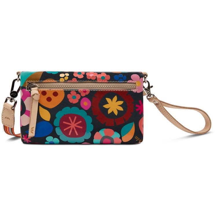 Colorful floral-patterned clutch bag on a white background