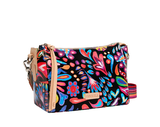 Colorful patterned handbag with a brand logo on a white background