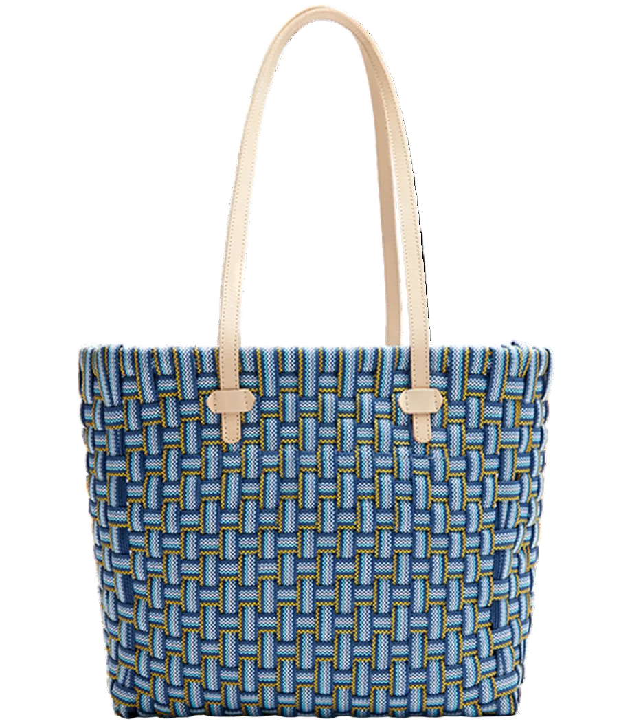 Blue woven tote bag with beige straps on a white background