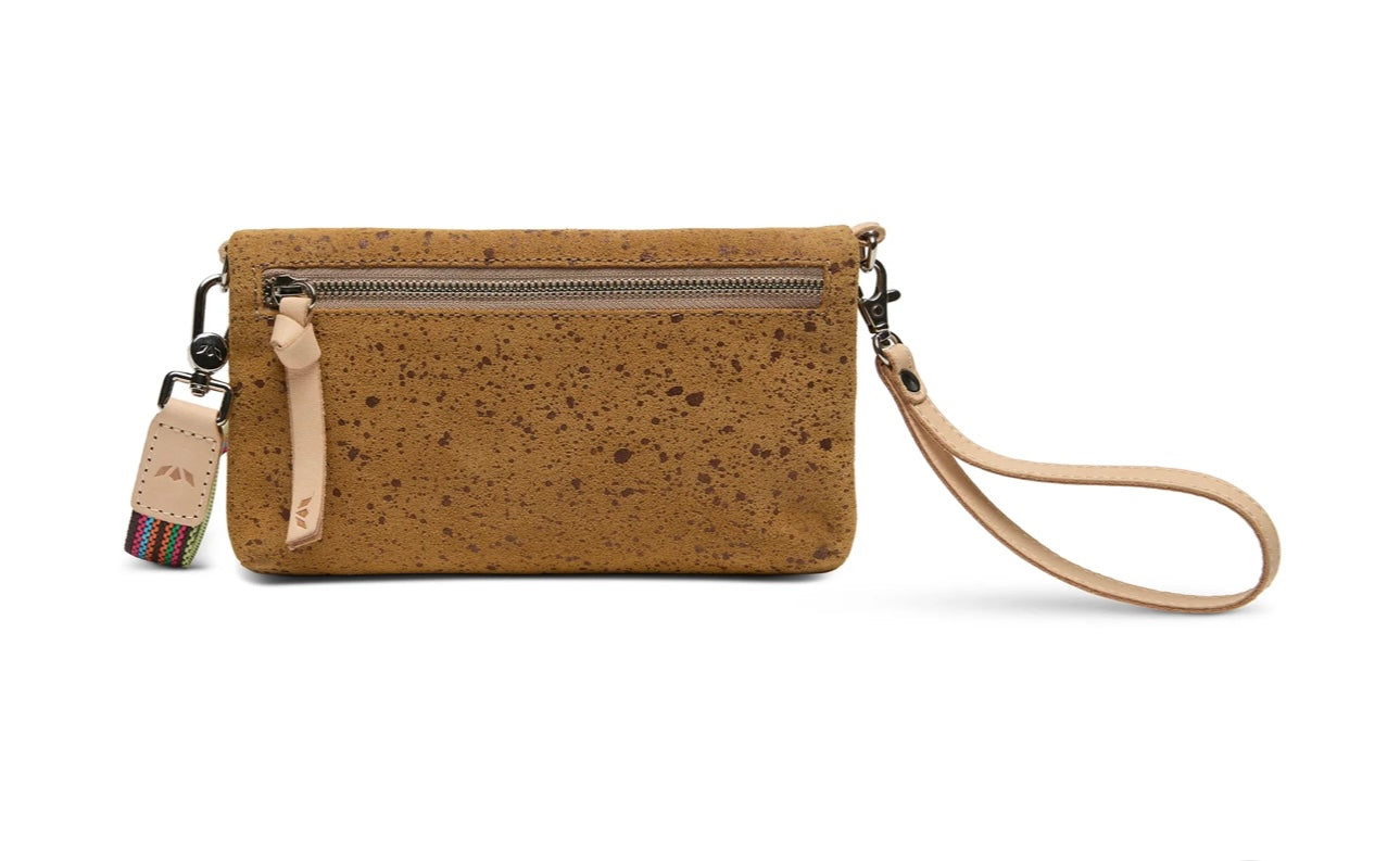 Cork wristlet with a strap on a white background