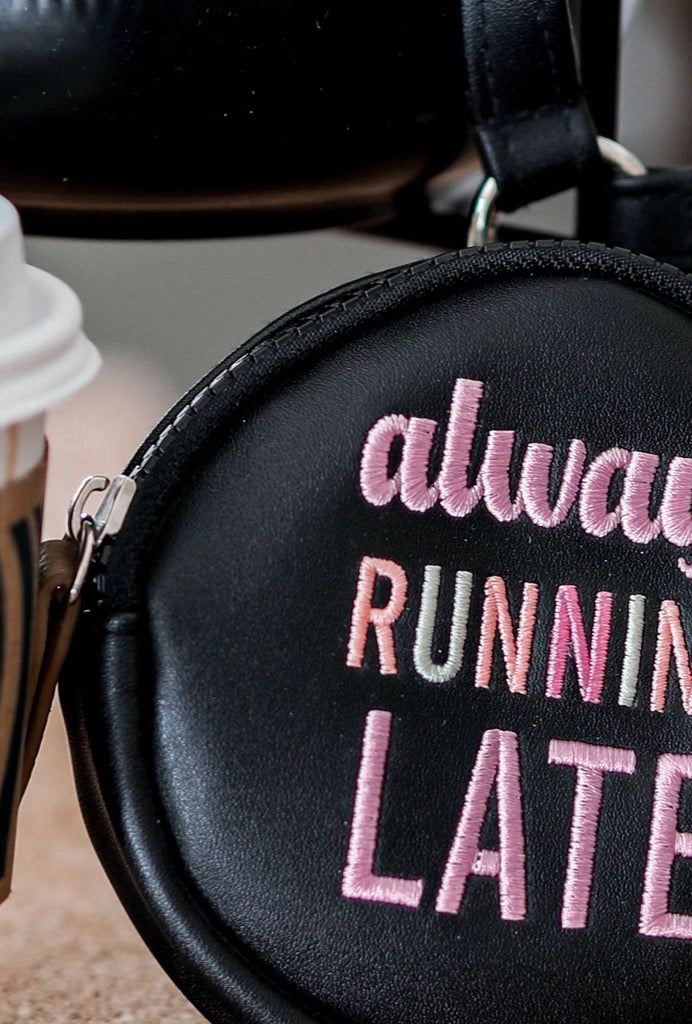 Black Wristlet Pink Embroidered Text "Always Running Late"