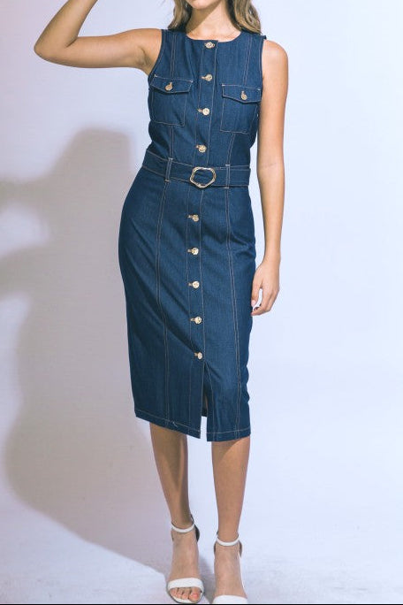 Woman wearing a blue denim dress with a red hat on a white background