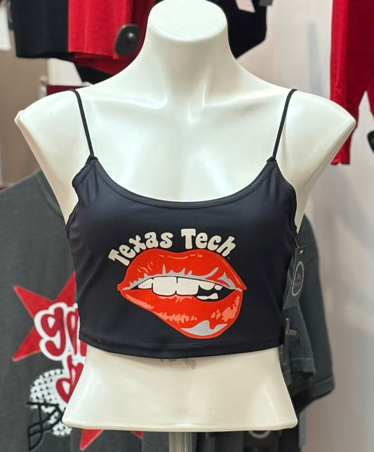 Mannequin wearing a black tank top with 'Texas Tech' and red lip graphic, surrounded by other clothing items.