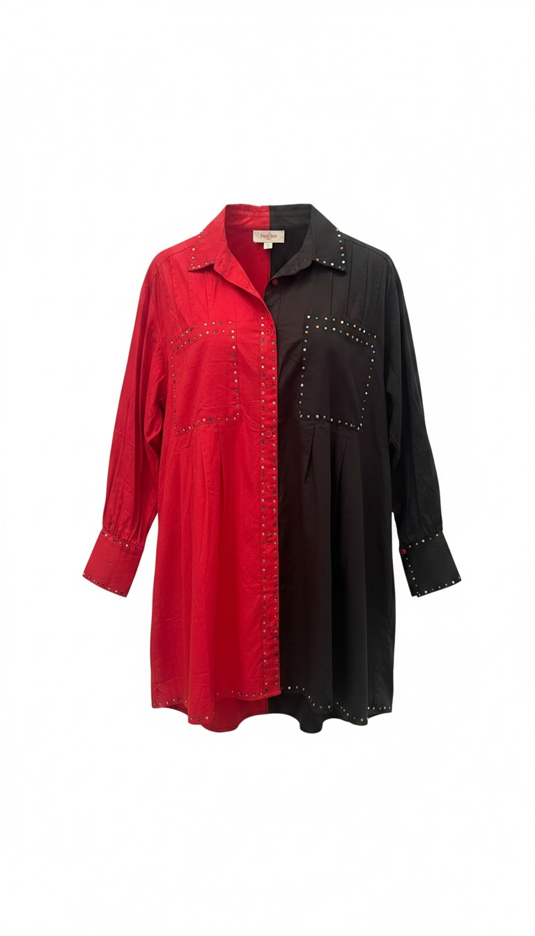 A long-sleeve button-front shirt dress with a split color-block design, featuring one half in bright red and the other in black, both with decorative metallic stud detailing along seams and pocket edges.